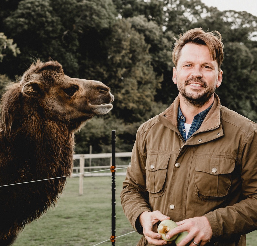 Picture of Jimmy Doherty next to a Camel